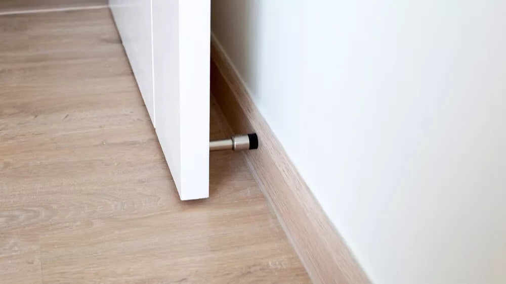 Hoe kies je de beste deurstopper?
