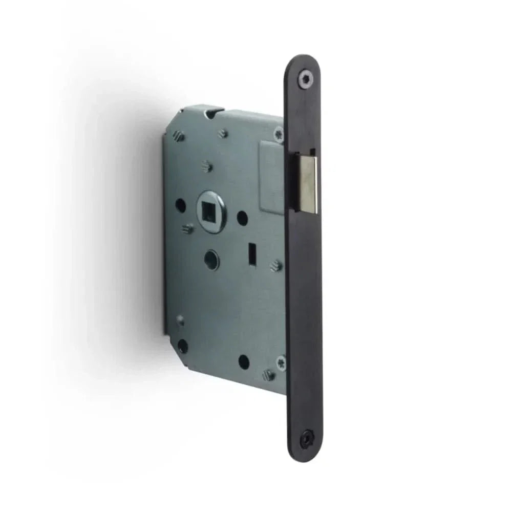 Formani BASICS LBLA-SFC loopdeurslot afgerond PVD Gun Metal — insteekslot zonder vergrendeling voor doorloop-binnendeur in donker-grijs metallic gunmetal, voor moderne industrieel-loft interieur en strakke nieuwbouw met antraciet-accent.