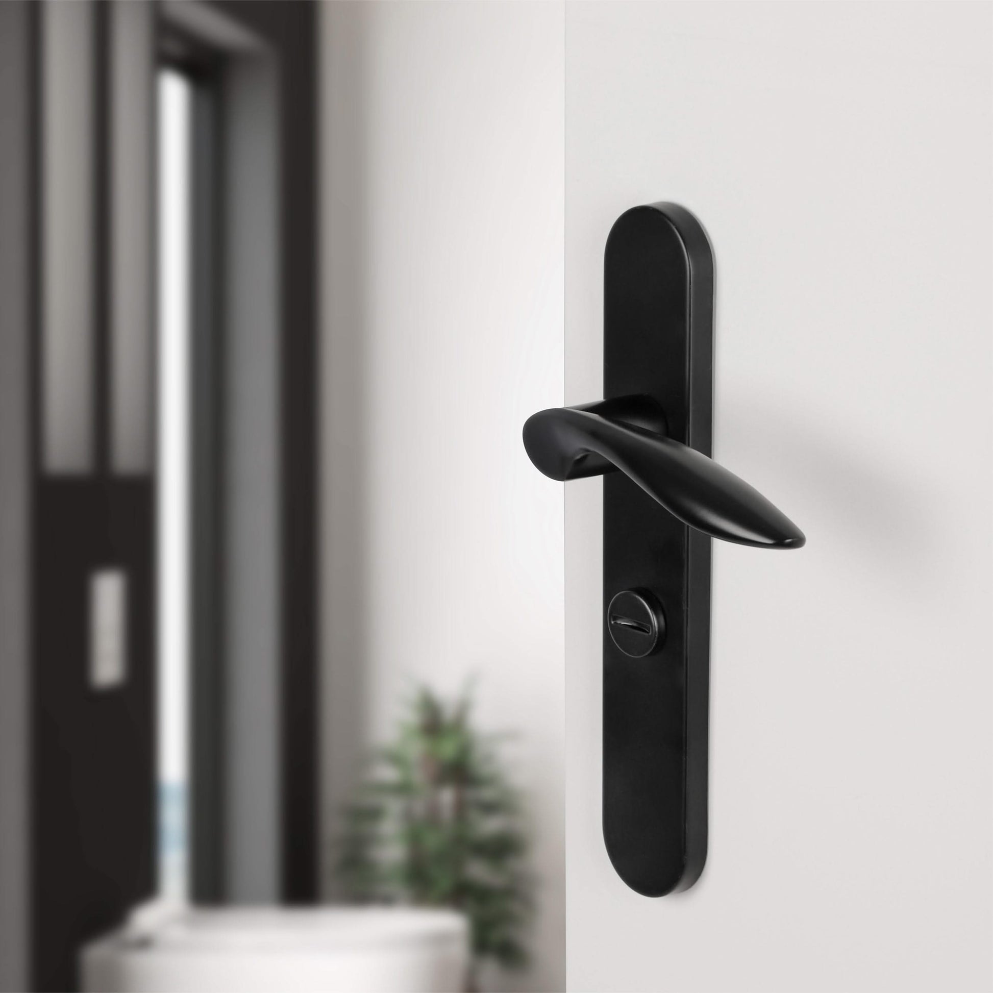 Differnz | Groningen deurkruk | ovaal schild | WC 63 mm | zwart - Deurbeslag-expert