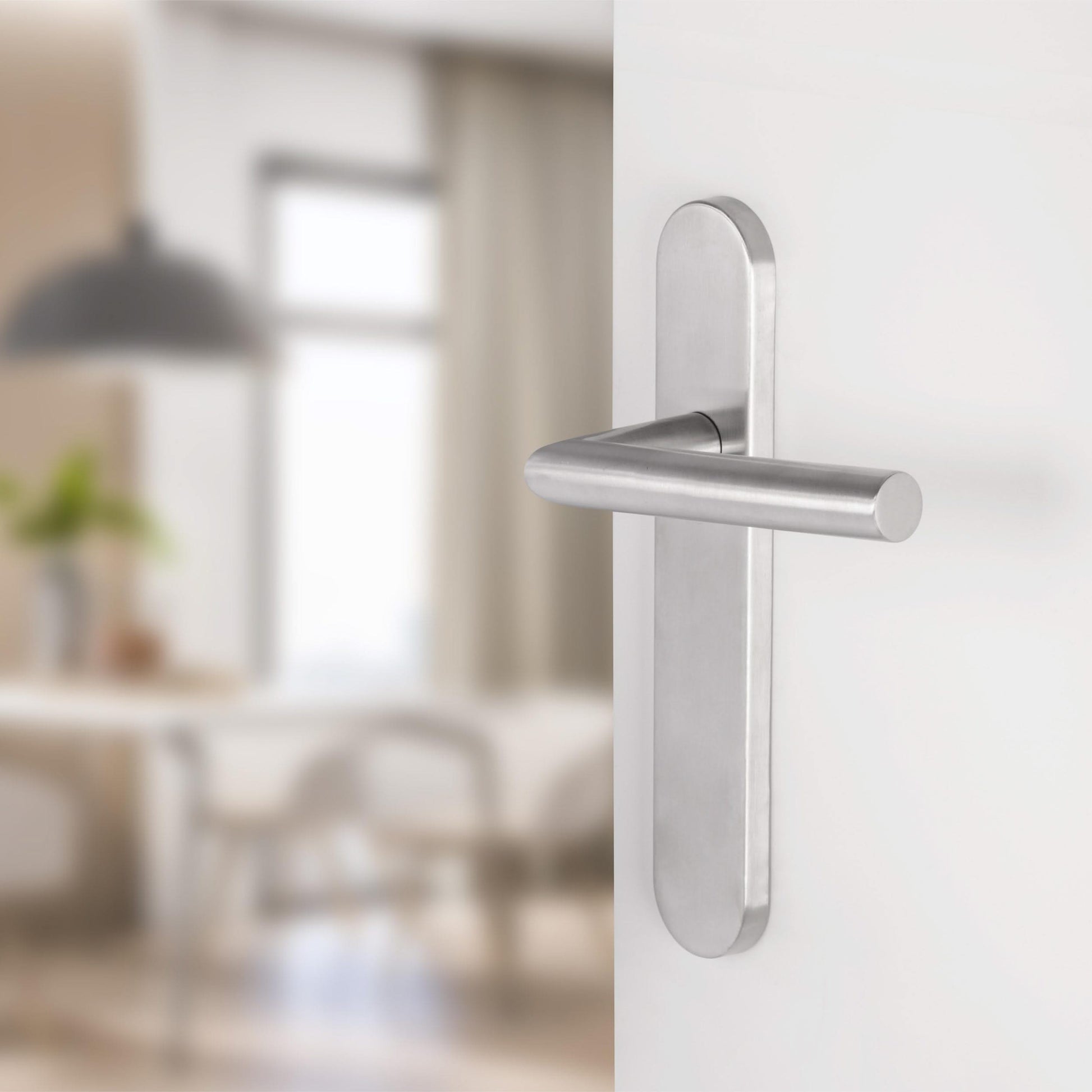 Differnz | Amsterdam deurkruk | ovaal schild | blind | mat chroom - Deurbeslag-expert