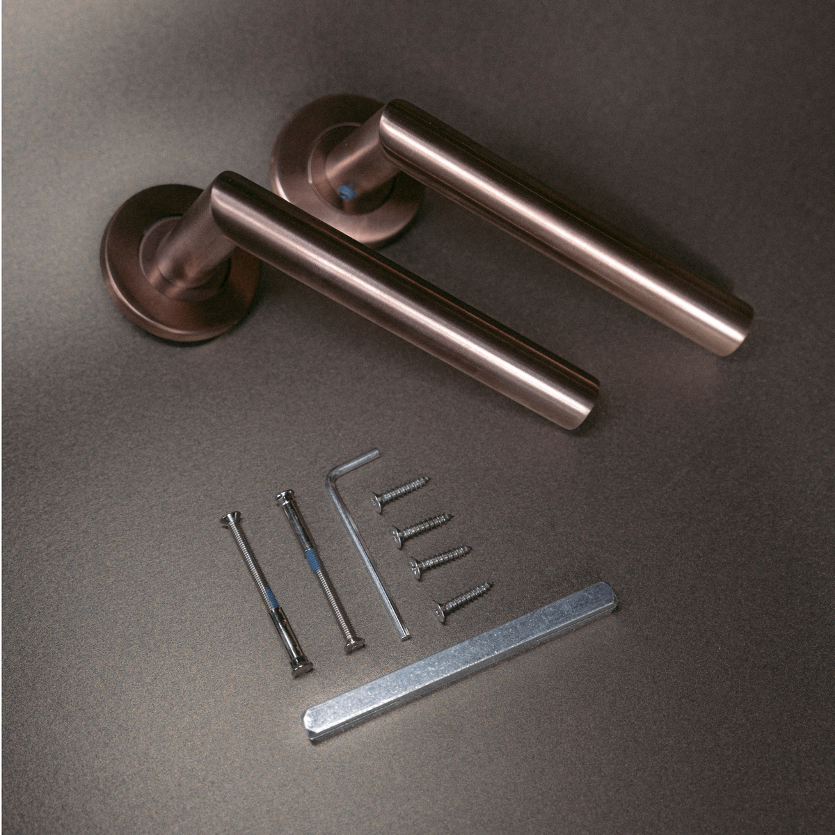 Intersteel deurkruk Q 01 op rozet verdekt ø52x6mm pvd brons