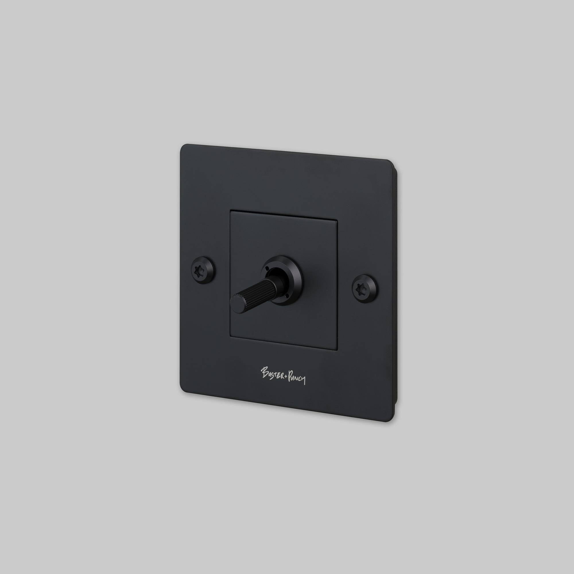buster + punch | lichtschakelaar 1-voudige tuimelschakelaar linear (met logo) | black