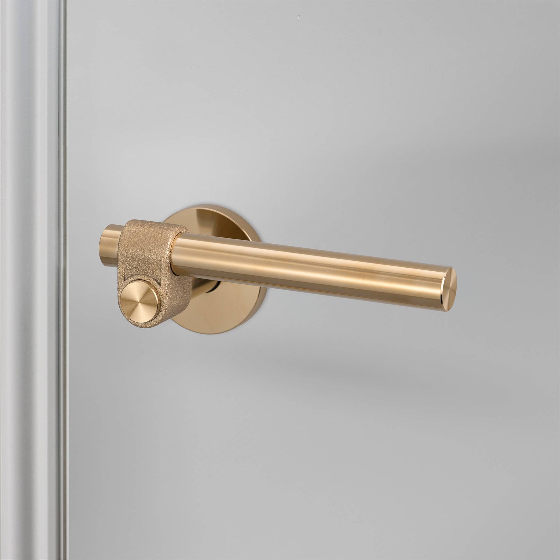 buster + punch cast | deurkruk op rozet | brass