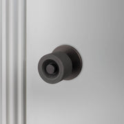 buster + punch cast | deurknop op rozet (draaibaar) | smoked bronze