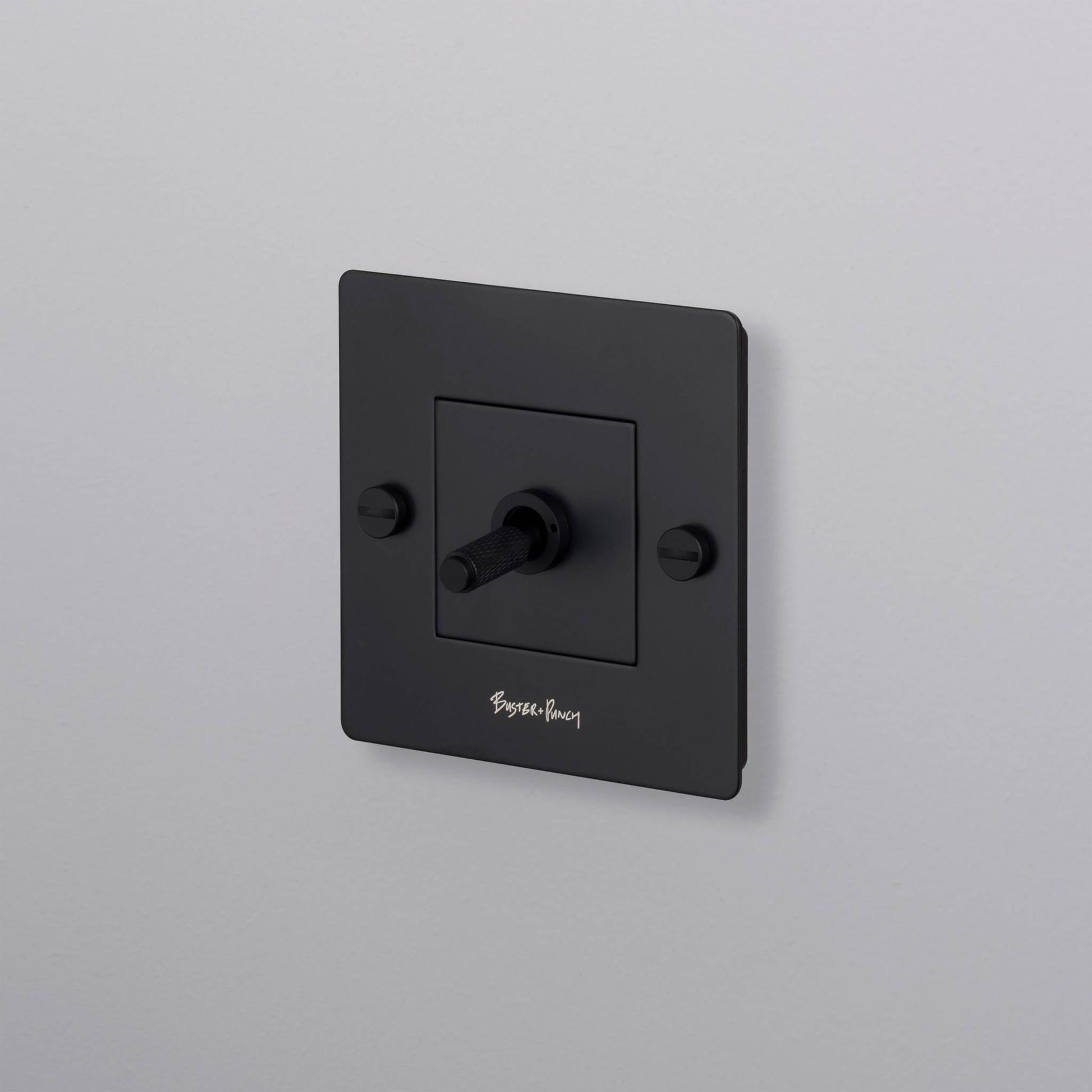 buster + punch | lichtschakelaar 1-voudige tuimelschakelaar cross (met logo) | black