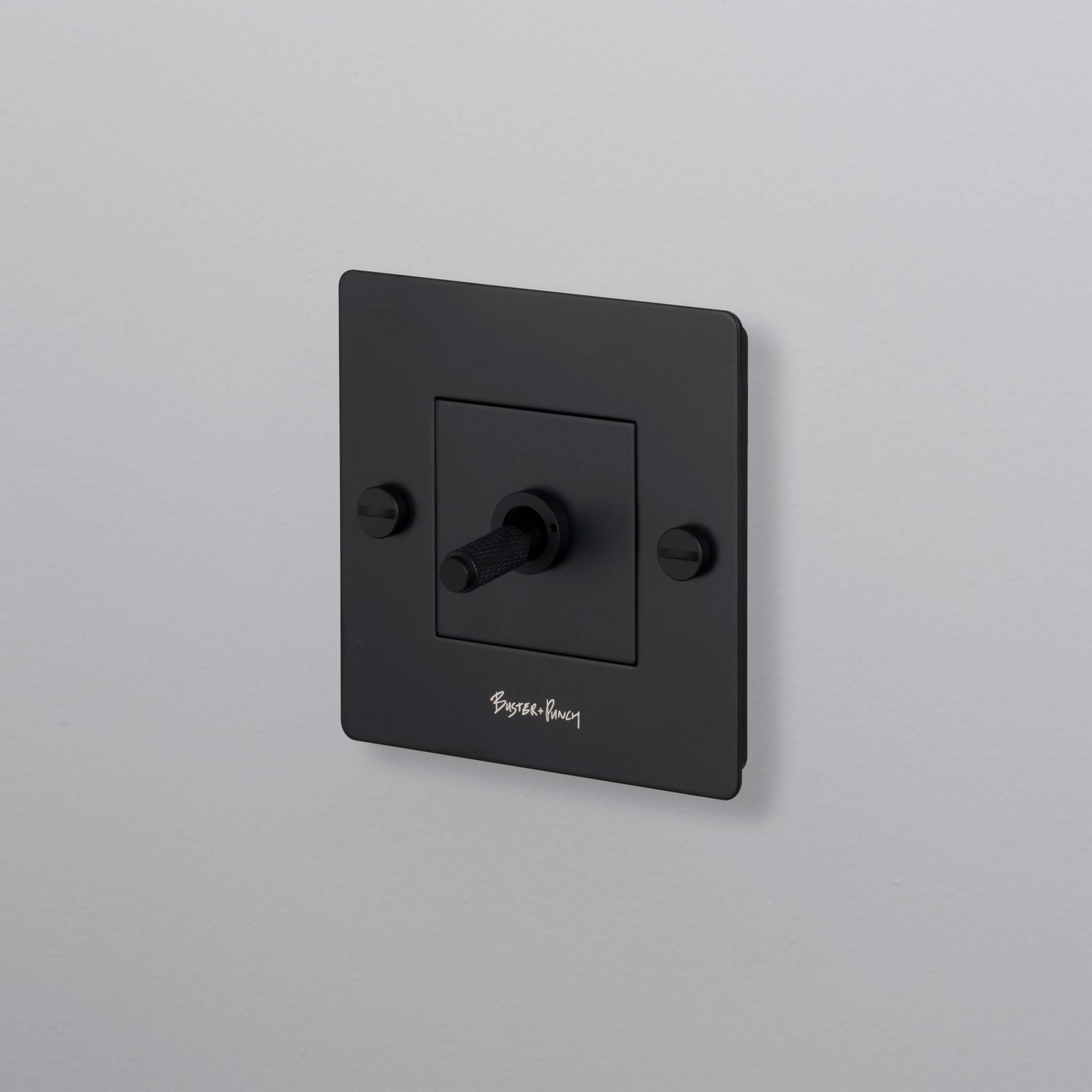 buster + punch | lichtschakelaar 1-voudige tuimelschakelaar cross (met logo) | black