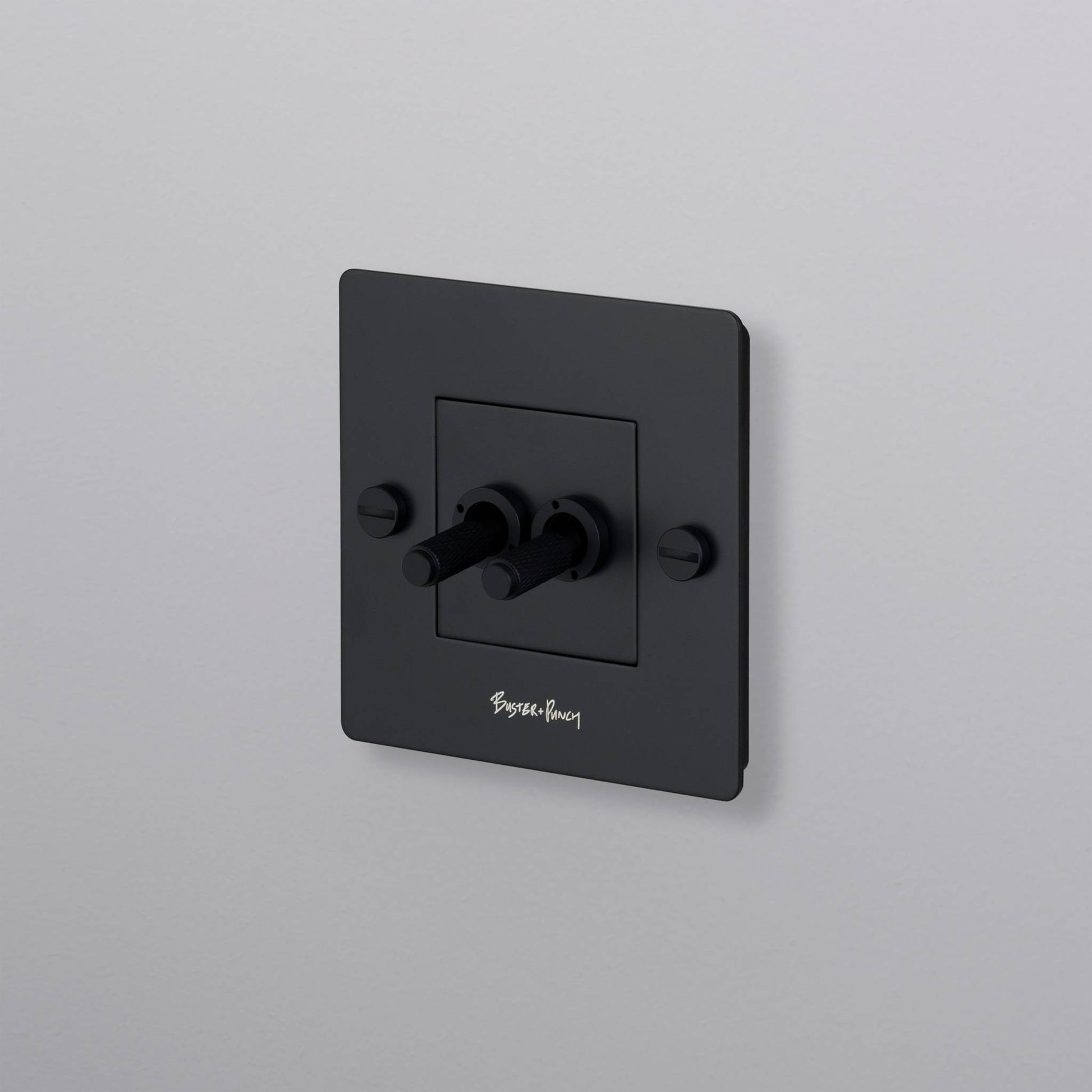 buster + punch | lichtschakelaar 1-voudig dubbele tuimelschakelaar (met logo) | black