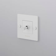 buster + punch | lichtschakelaar 1-voudige tuimelschakelaar cross (met logo) | white