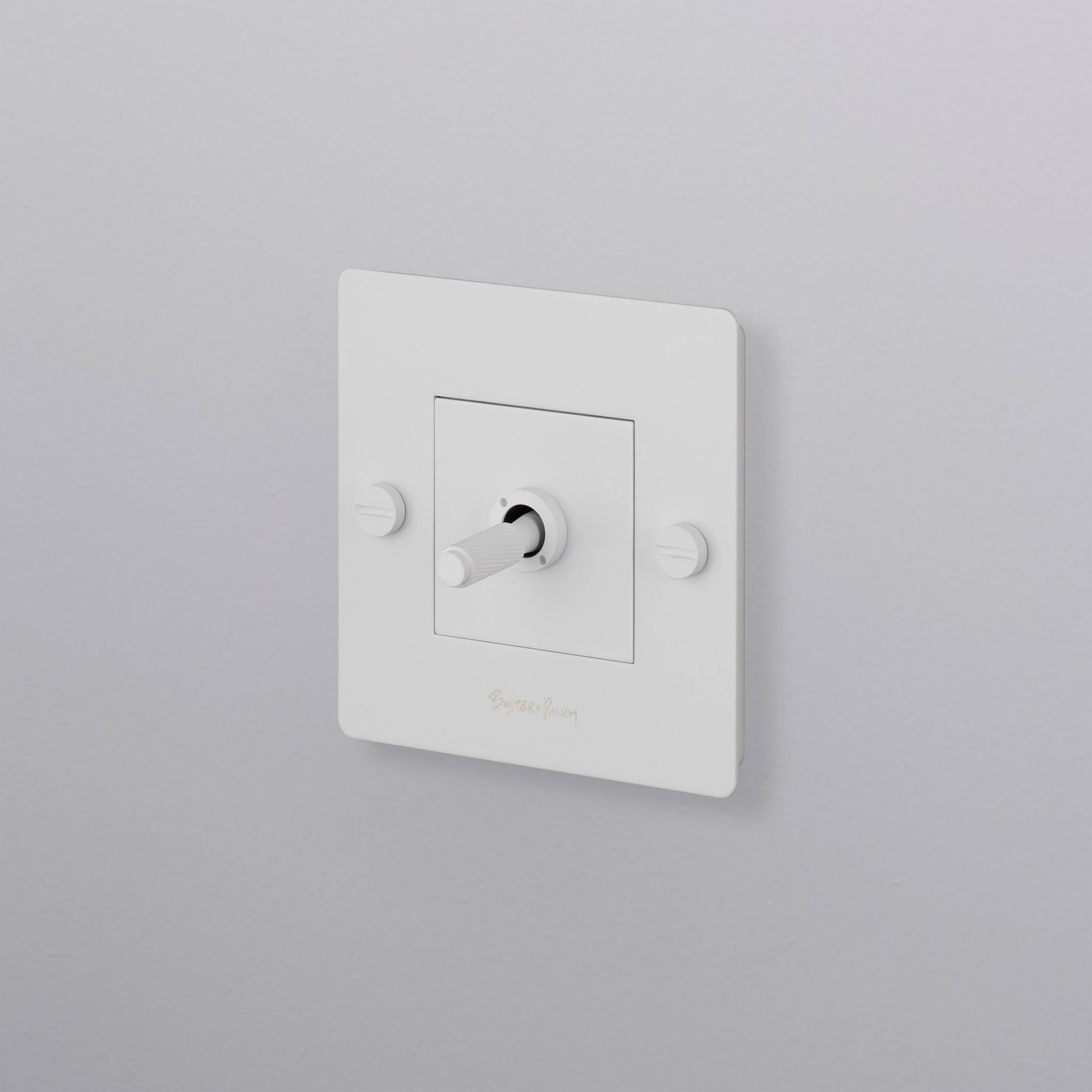 buster + punch | lichtschakelaar 1-voudige tuimelschakelaar cross (met logo) | white