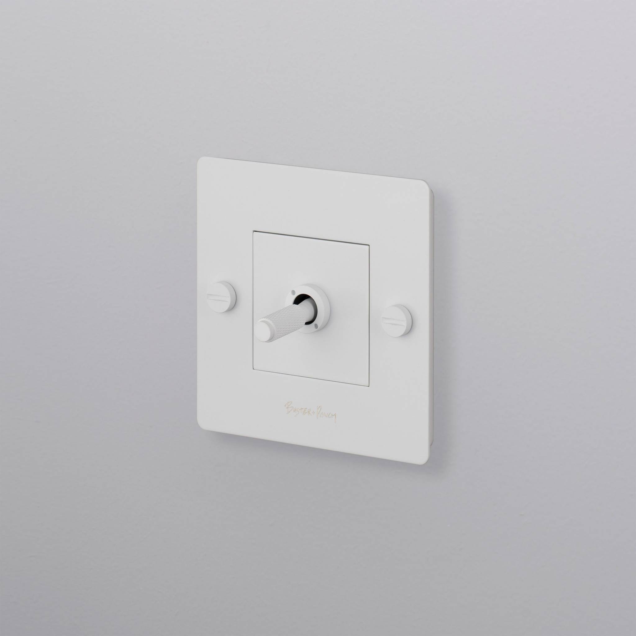 buster + punch | lichtschakelaar 1-voudige tuimelschakelaar cross (met logo) | white