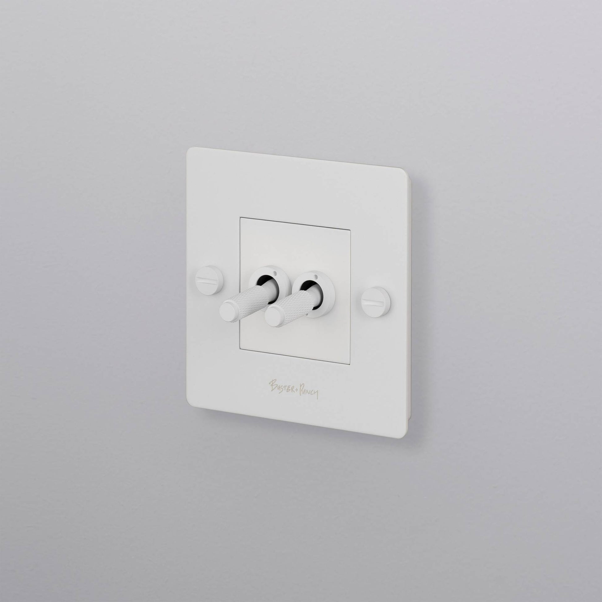 buster + punch | lichtschakelaar 1-voudig dubbele tuimelschakelaar (met logo) | white