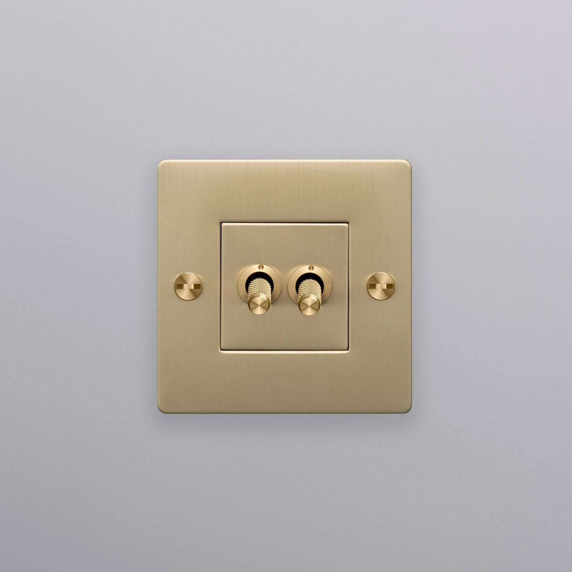 buster + punch | lichtschakelaar 1-voudig dubbele tuimelschakelaar (zonder logo) | goud zijaanzicht