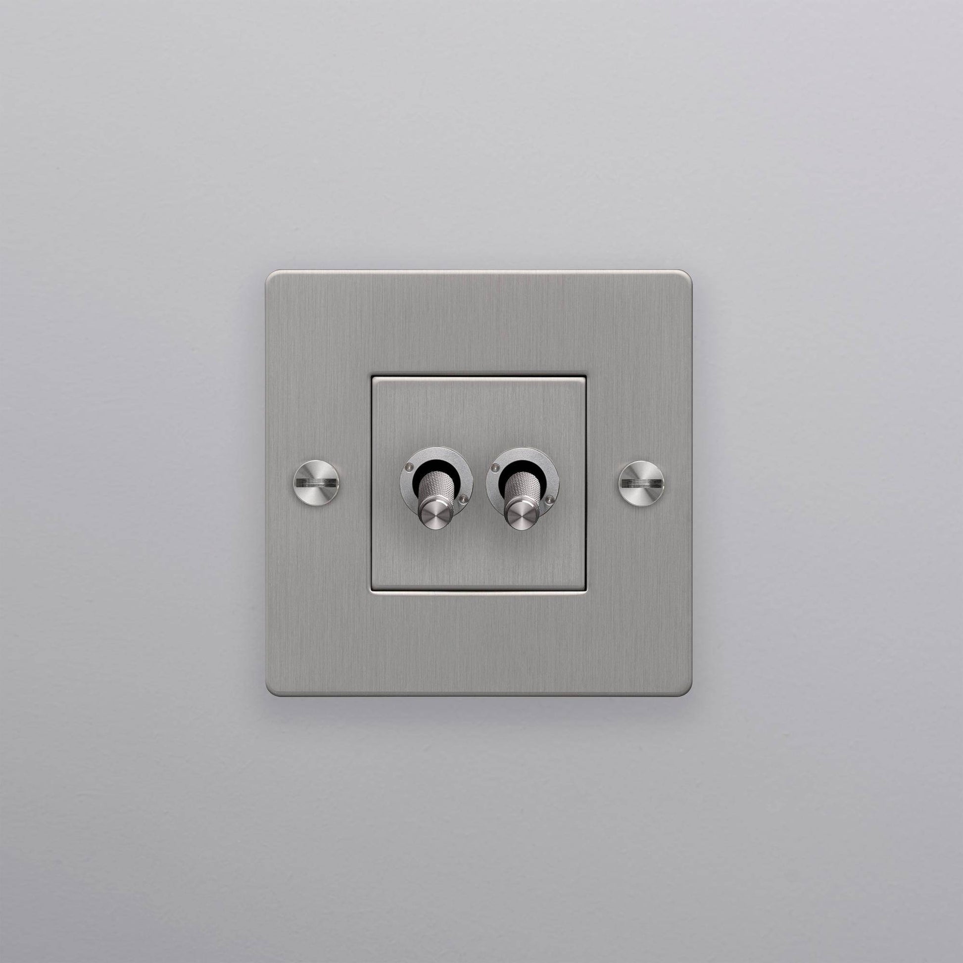 buster + punch | lichtschakelaar 1-voudig dubbele tuimelschakelaar (zonder logo) | steel zijaanzicht