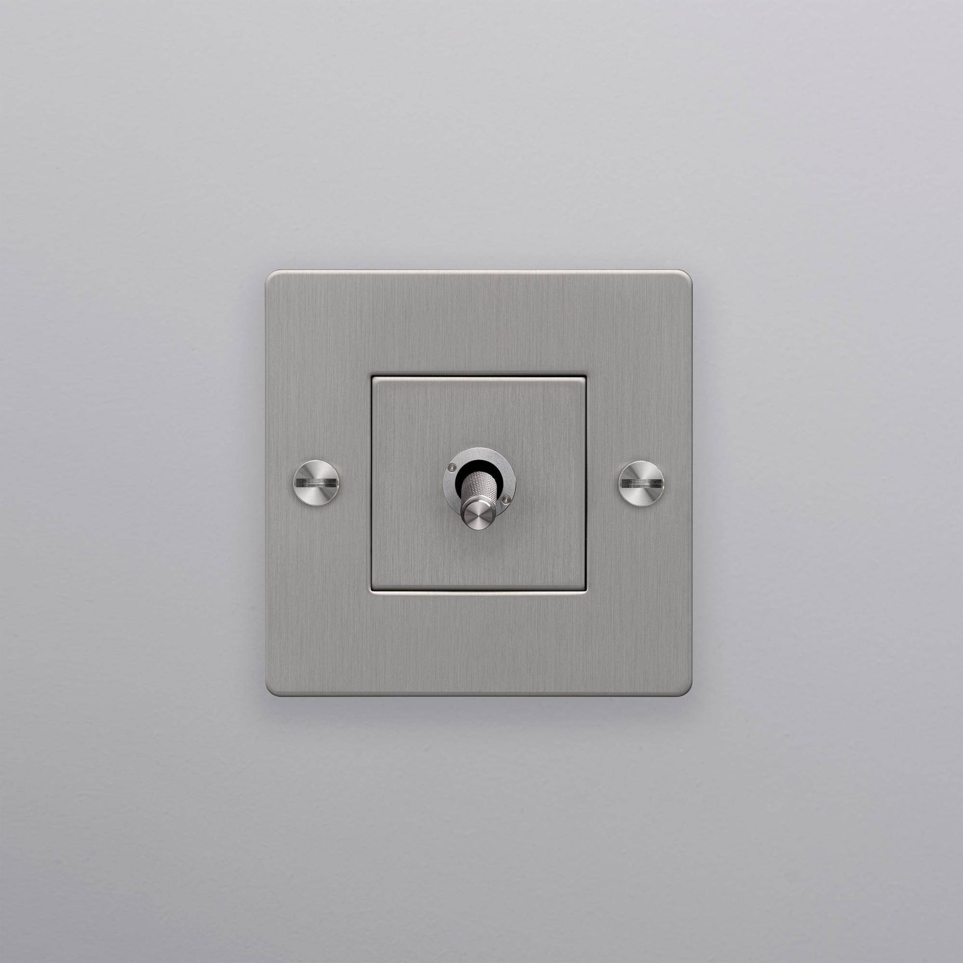 buster + punch | lichtschakelaar 1-voudige tuimelschakelaar cross (zonder logo) | steel zijaanzicht