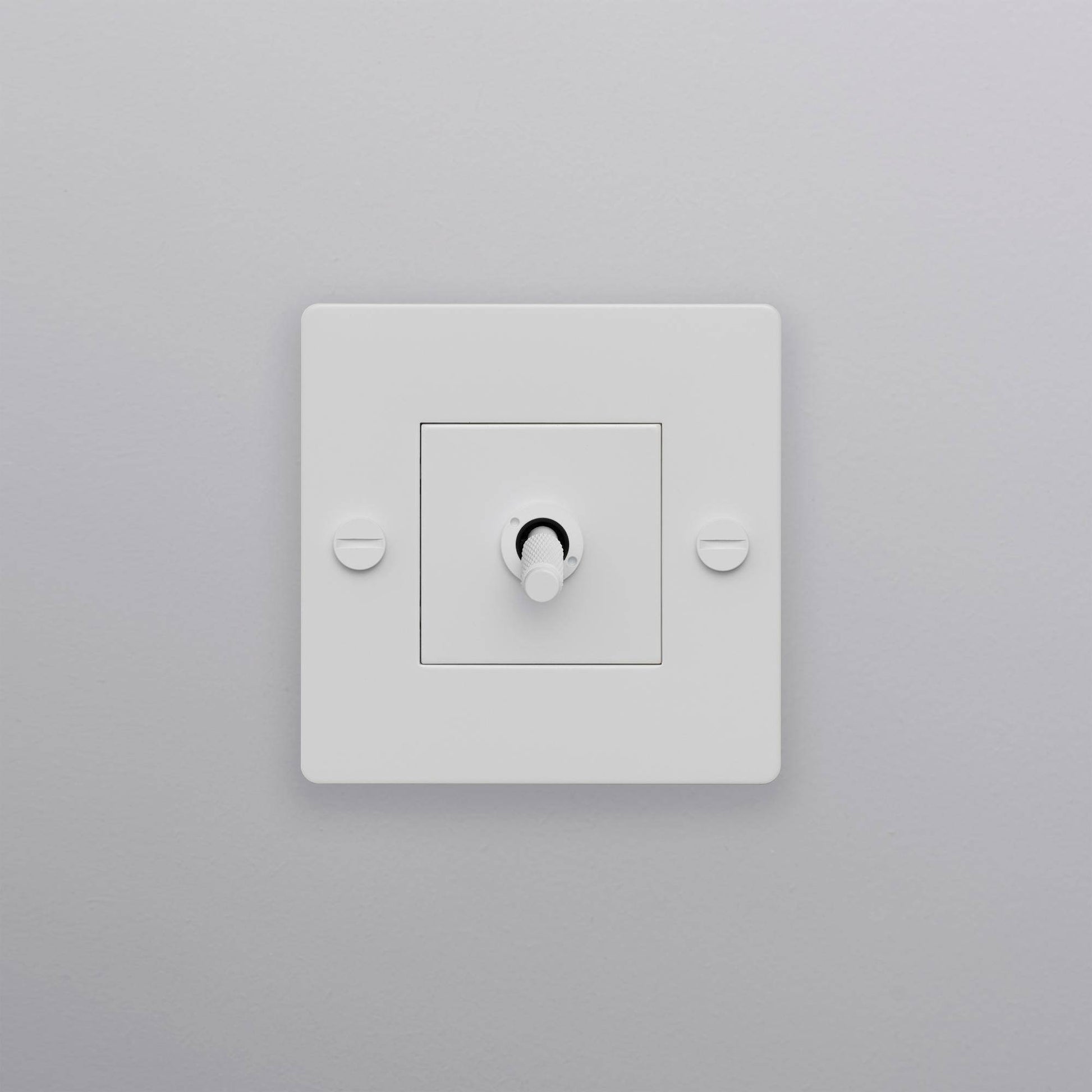 buster + punch | lichtschakelaar 1-voudige tuimelschakelaar cross (zonder logo) | white zijaanzicht