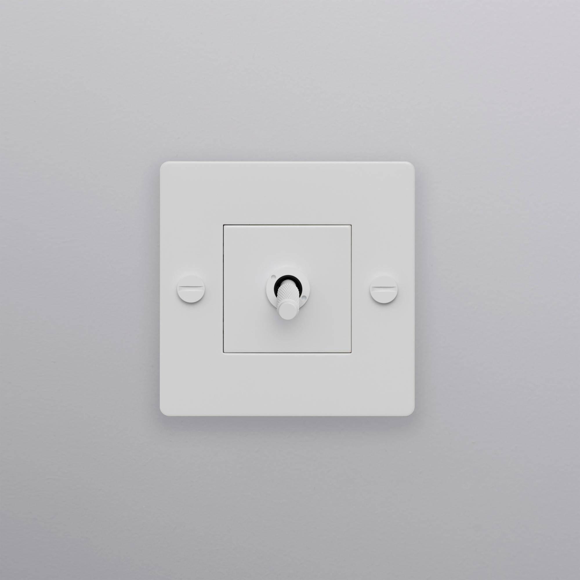 buster + punch | lichtschakelaar 1-voudige tuimelschakelaar cross (zonder logo) | white zijaanzicht