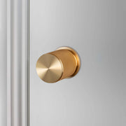 buster + punch cross | deurknop op rozet (draaibaar) | goud