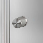 buster + punch cross | deurknop op rozet (draaibaar) | steel