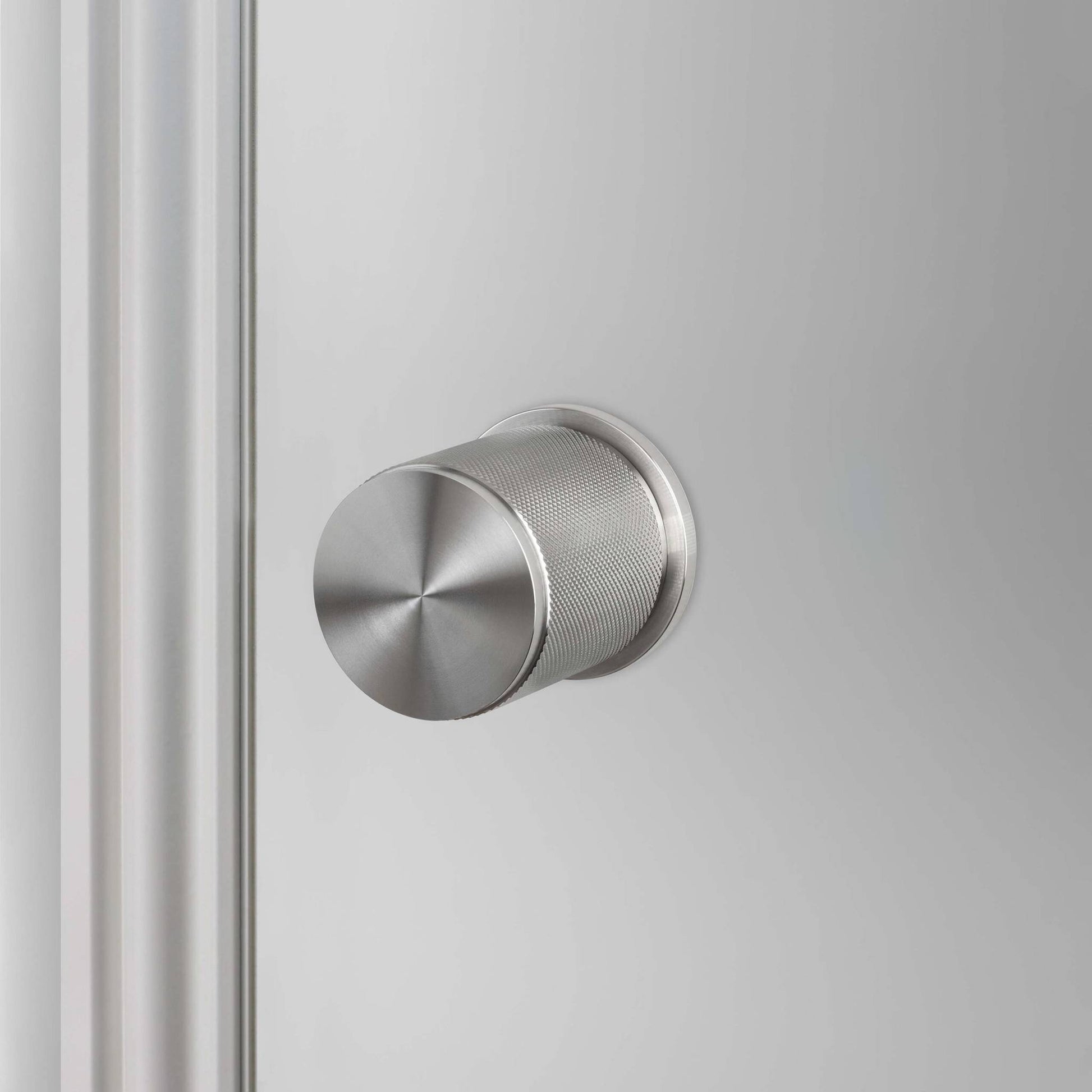 buster + punch cross | deurknop op rozet (draaibaar) | steel