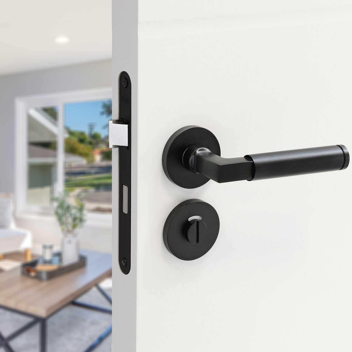 https deurbeslag expert.nl product impresso deurkruk aston zwart op rond rozet 