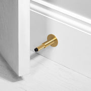 buster + punch cross | deurstopper wandmontage | goud