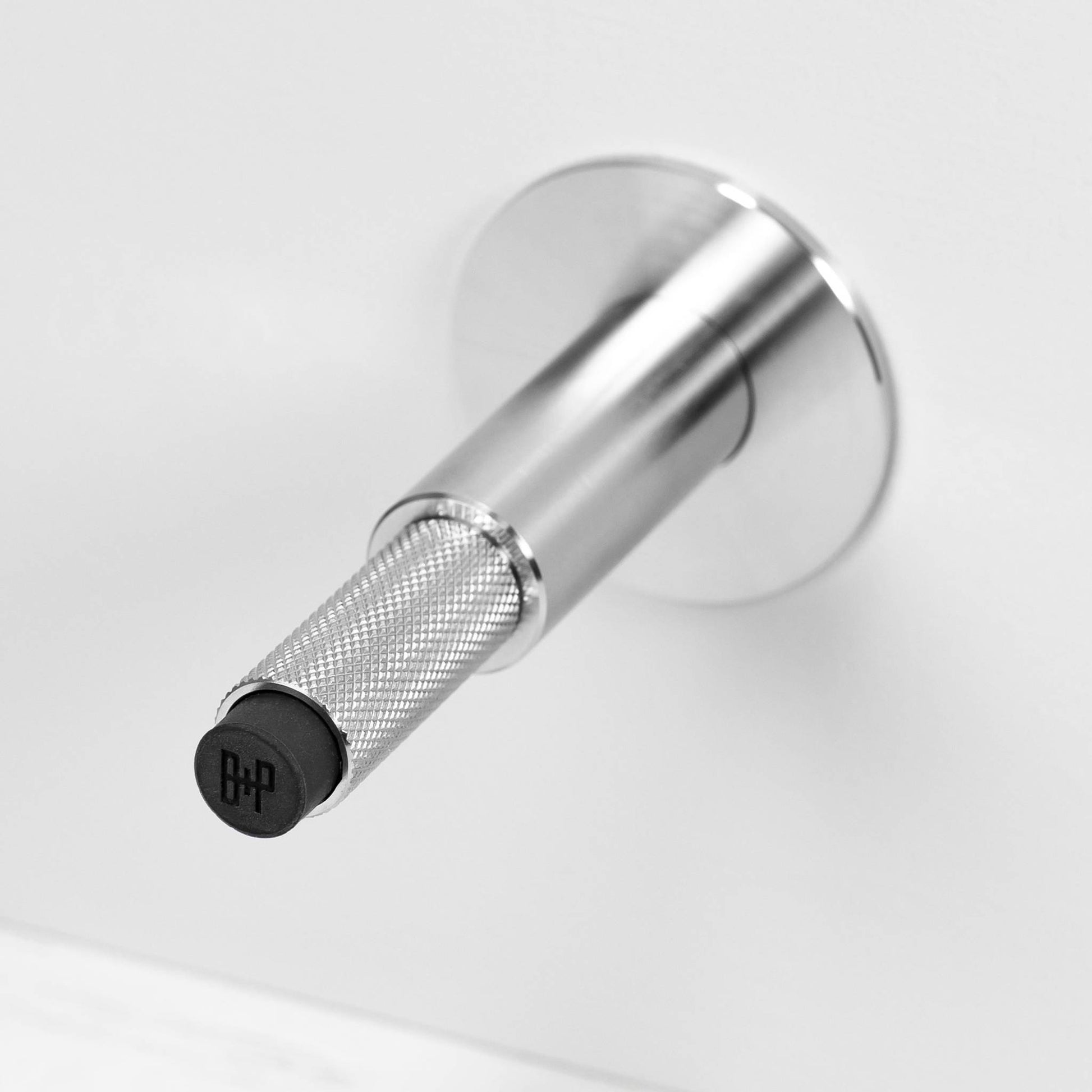 buster + punch cross | deurstopper wandmontage | steel