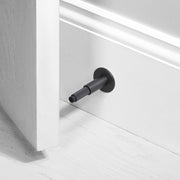 buster + punch cross | deurstopper wandmontage | smoked bronze