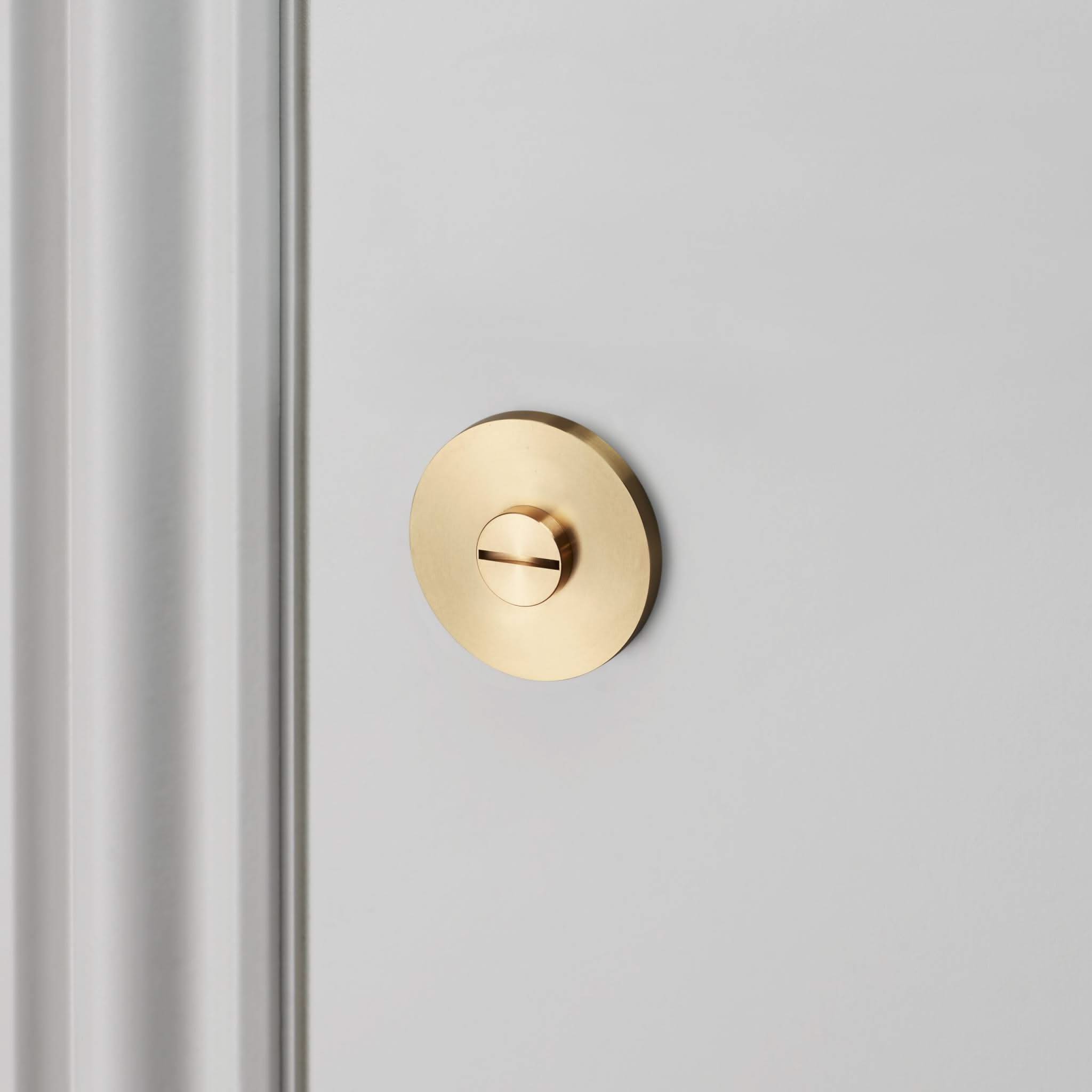 buster + punch cross | thumbturn-/wc-slot | brass