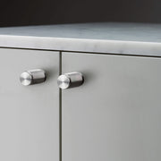 buster + punch cross | meubelknop | steel