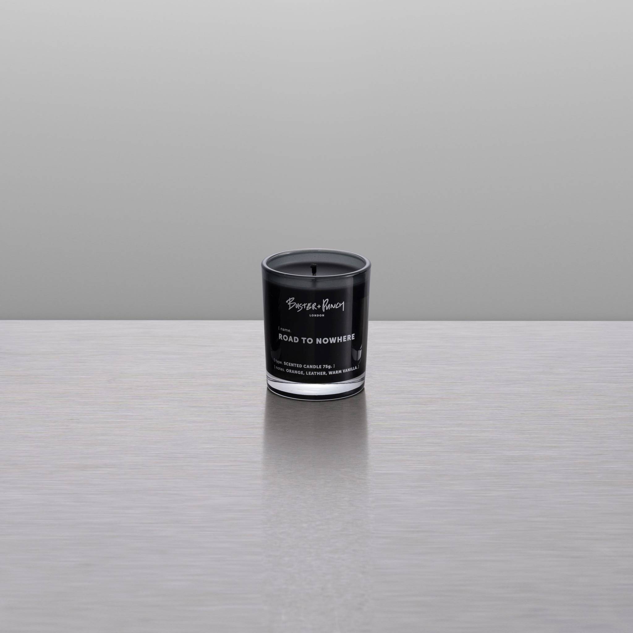 Buster + Punch | Geurkaars 75g (Road to Nowhere) | Rookgrijs glas