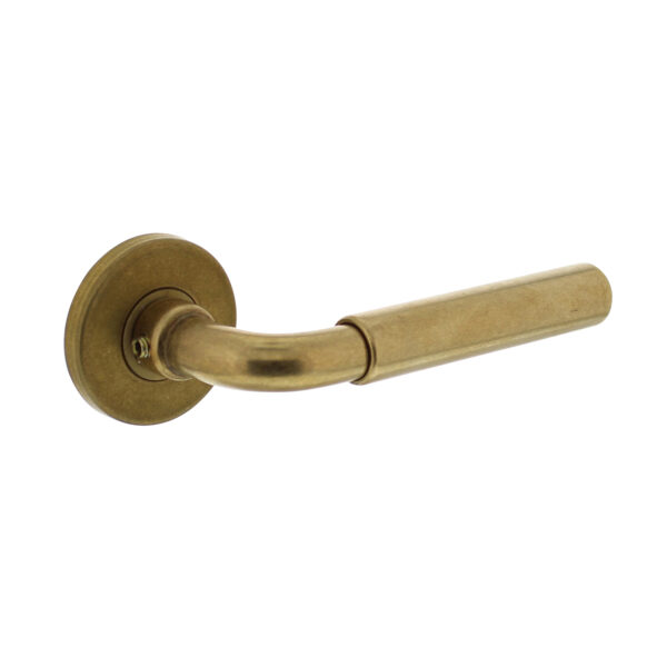 Palma door handle, tumbled brass, on rosette